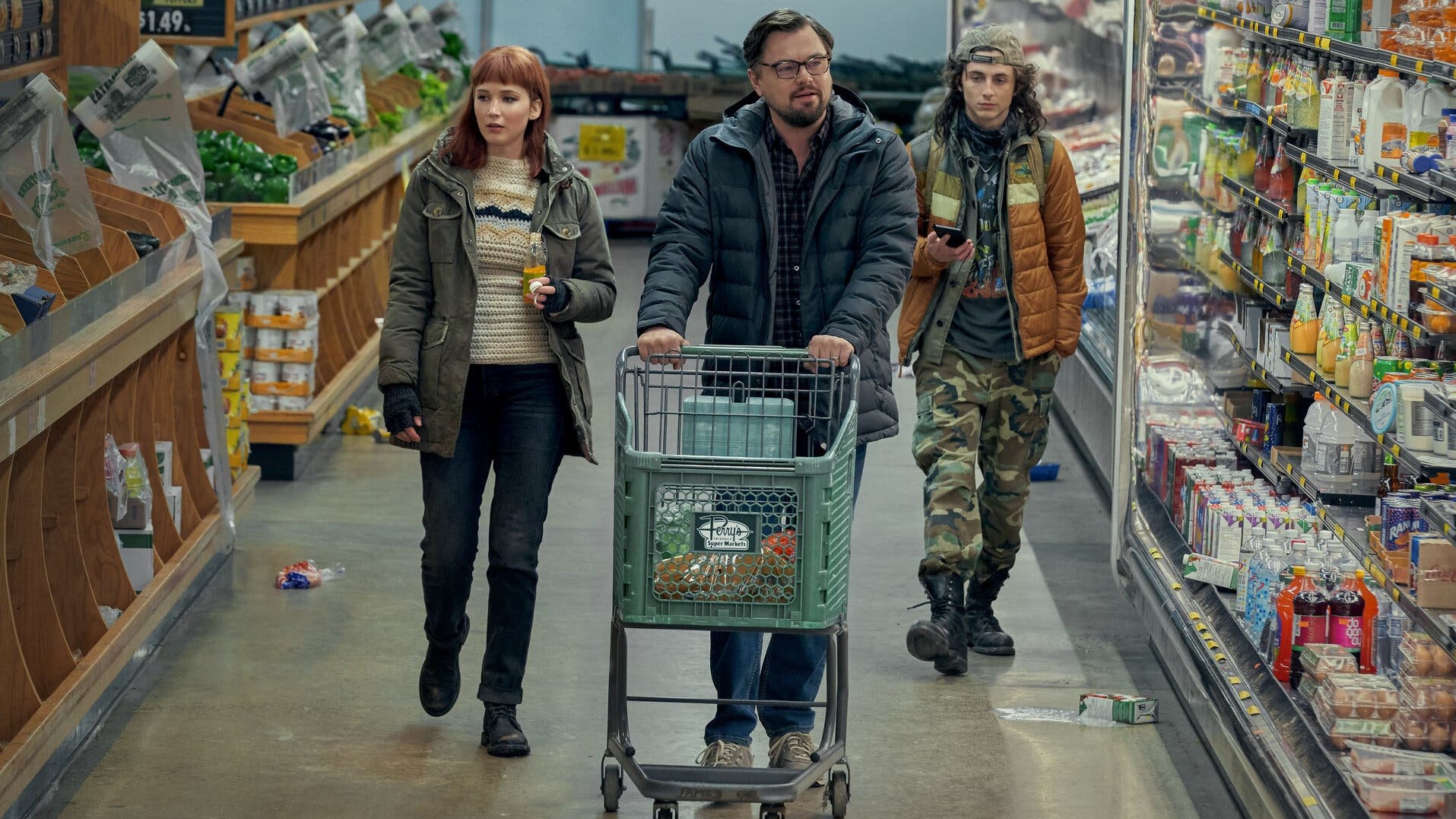 scene from Don't Look Up of three people walking through a grocery store